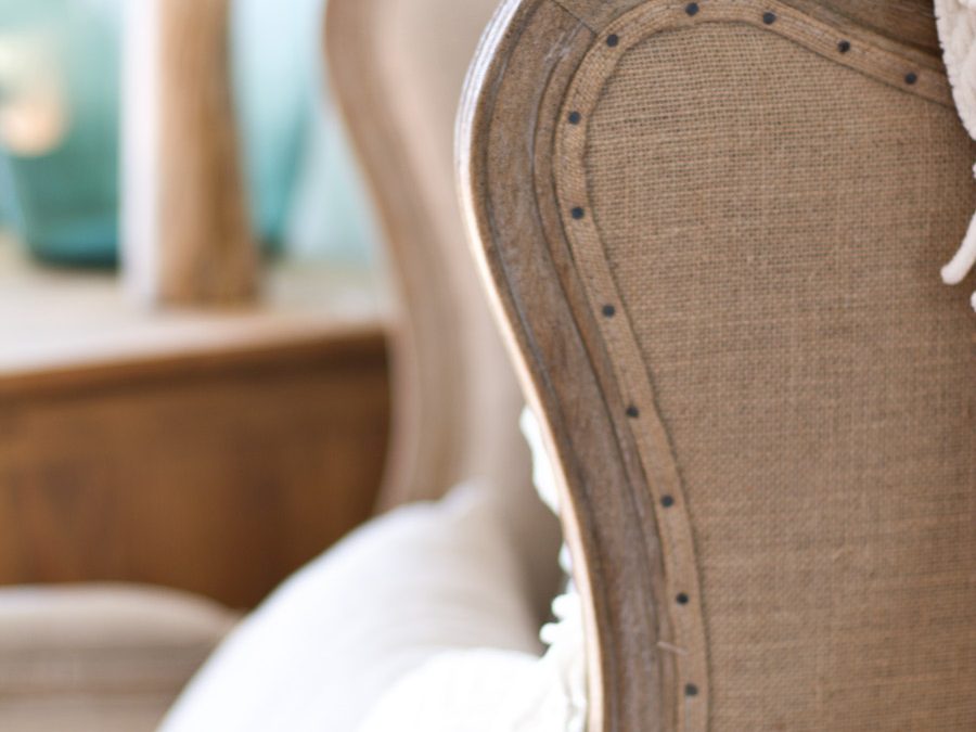 the linen wingback with nailhead trim